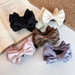 Beau - Elegant Solid Bow Banana Clip