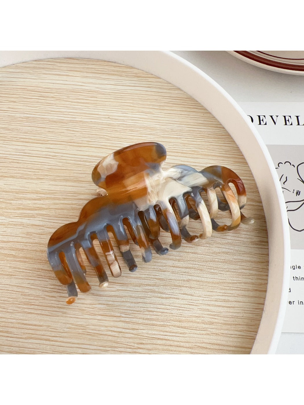 Beau claw clip displayed alongside matching hair accessories