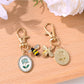 Close-up of the rose flower print on the alloy keychain pendant