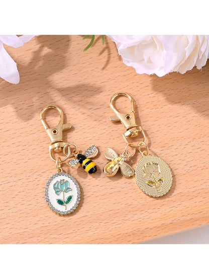 Close-up of the rose flower print on the alloy keychain pendant