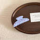 Beau gentle blue hair clip with soft matte finish close-up