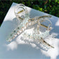 Close-up of Beau flower crisscross hair claw clip showing floral design