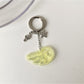 Keypus - Acrylic Alloy Wing Music Note Bag Charm Keychain