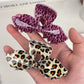Beau hair claw clip open to display claw teeth and bow design