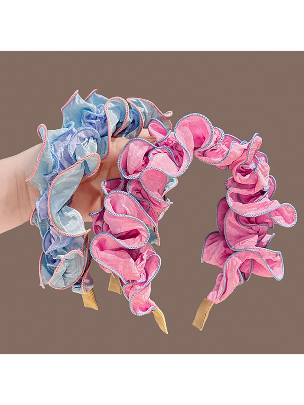 Gifty ruffle pleated fabric headband displayed on a white background