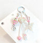Keychain with heart shaped butterfly charm attached to a set of keys