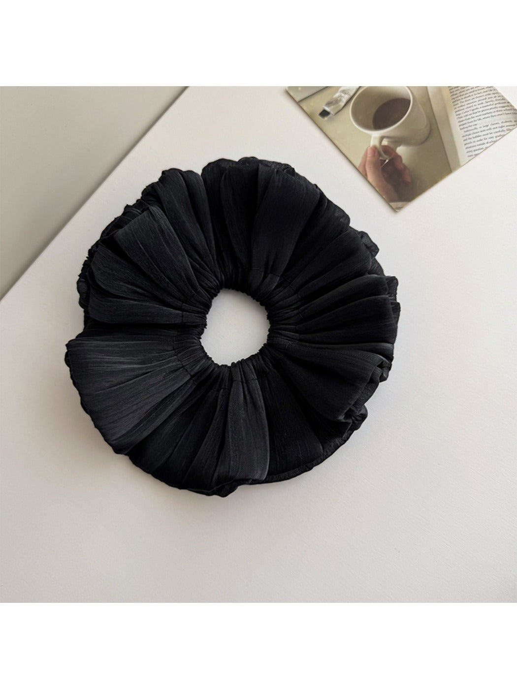 Gifty double layer shimmer scrunchie worn on a wrist as a bracelet