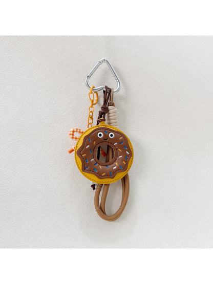 Donut keychain displayed on a white background with soft shadows