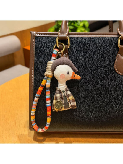 Top view of the duck charm keychain highlighting its compact size and design