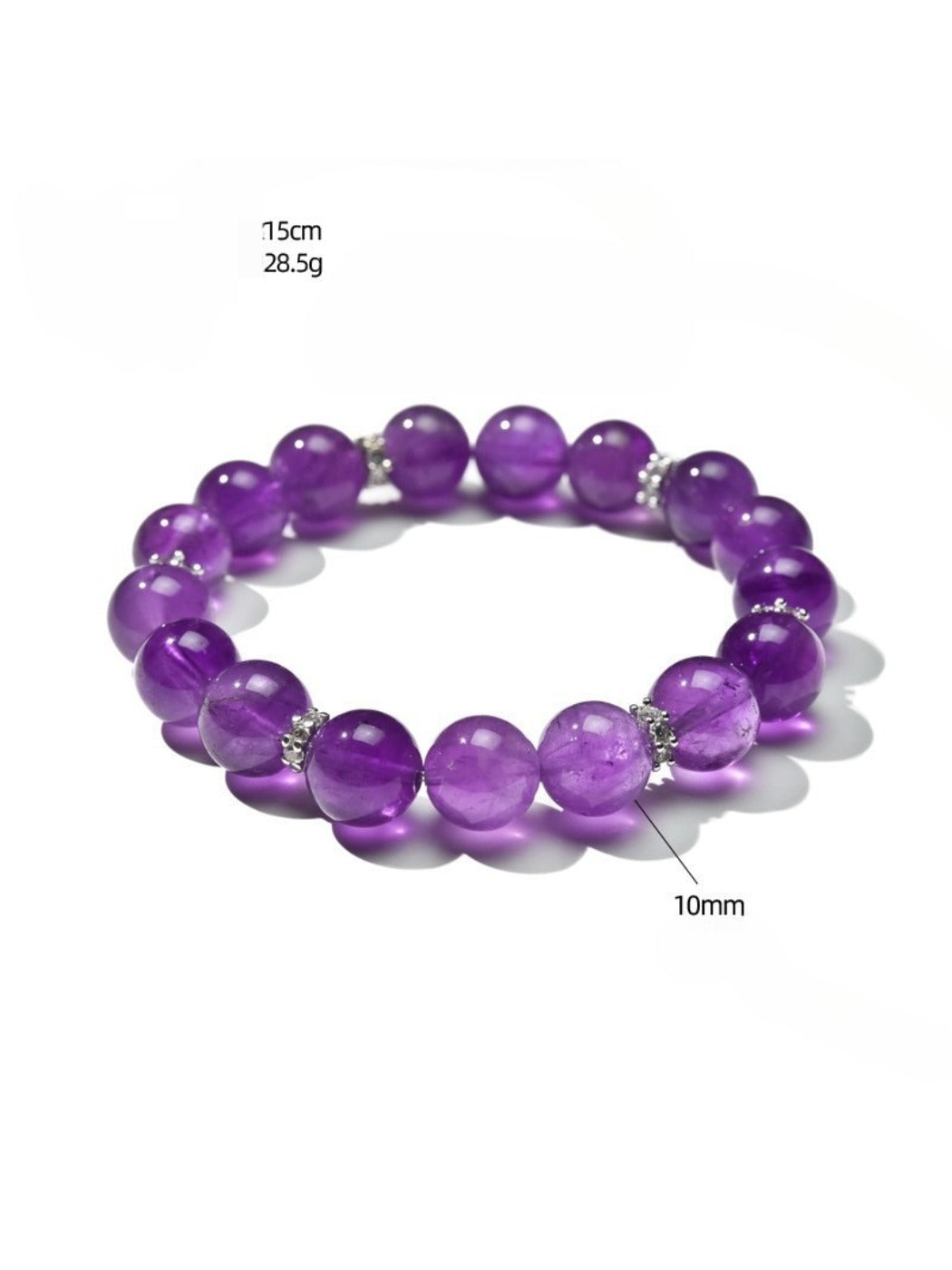 Purple crystal beads of Lovra bracelet arranged in a circle on white background