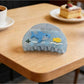 Beau Coastal Ocean Series acetate hair clip styled in long hair with ocean color tones