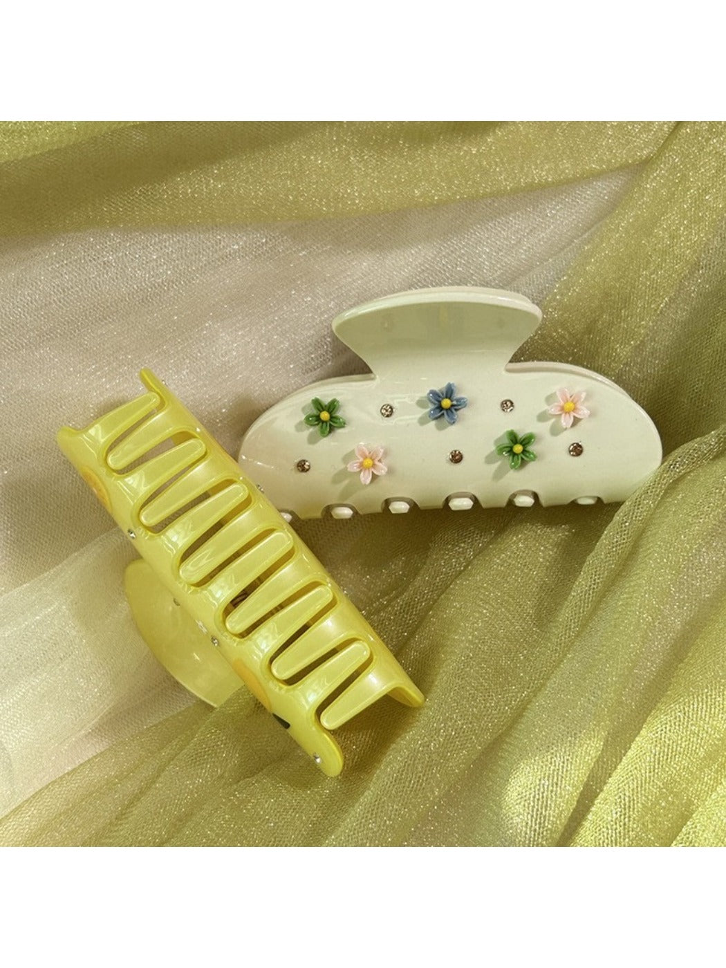 Side view of Beau floral crescent hair claw clip highlighting curved shape