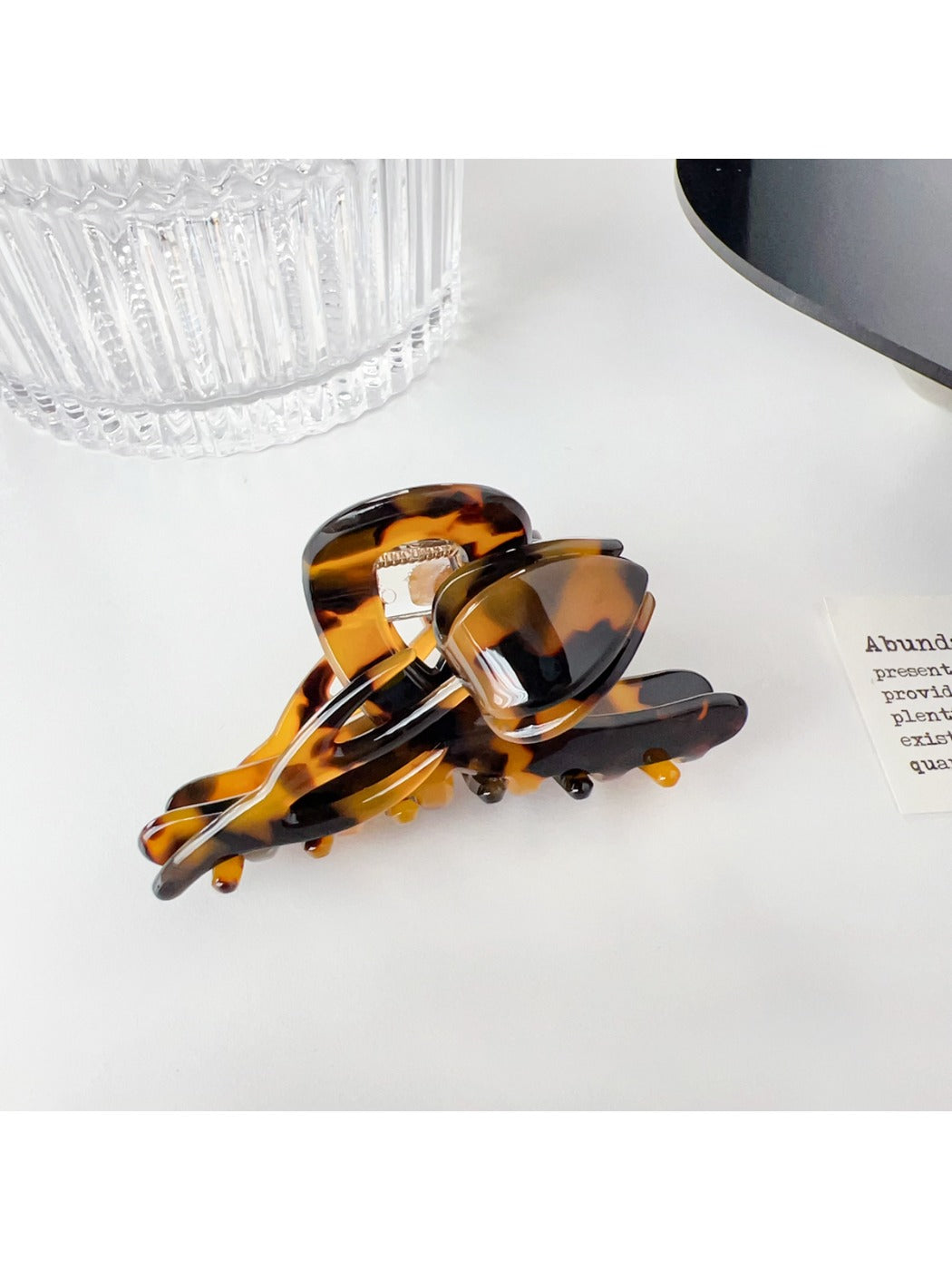 Beau floral hair claw clip shown from back to display clasp mechanism