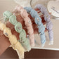 Gifty - Textured Toothed Curved Wrapped Headband