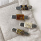 Beau vintage flat hair clip open, displaying metal clasp mechanism