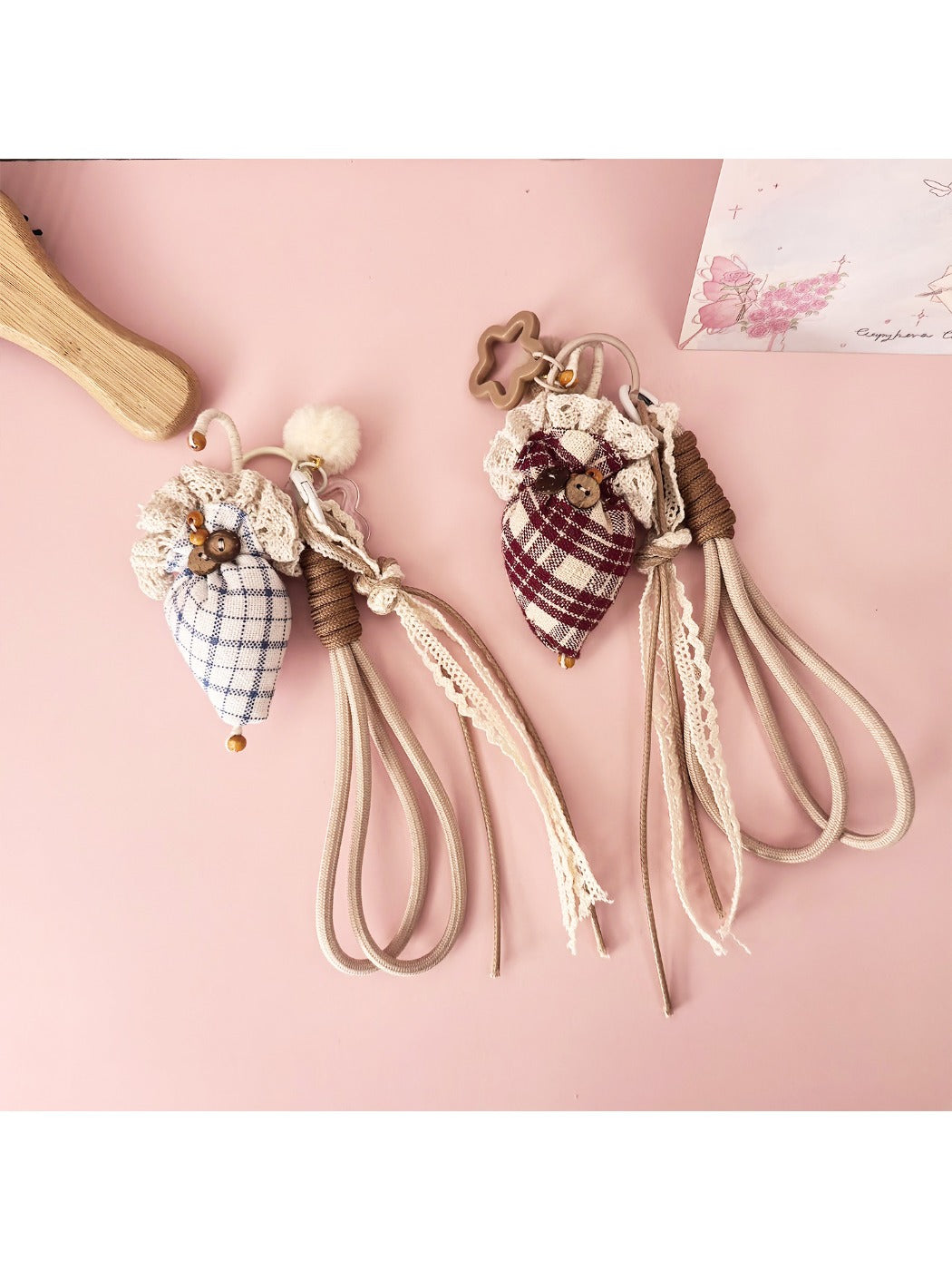 Close-up of plaid fabric strawberry umbrella keychain showing detailed stitching