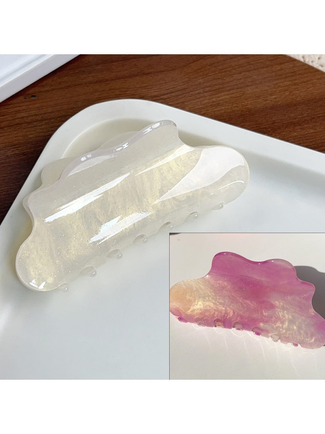 Beau hair claw clip displayed on a wooden surface with soft lighting