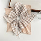 Plaid lace bow bandana scrunchie displayed flat showing fabric texture