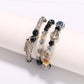 Lovra elegant beaded bracelet styled with matching jewelry on model's arm