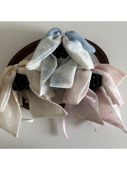 Close-up of Beau bow ribbon streamer claw clip showing detailed ribbon texture