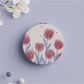Mirroray Tulip Patterned Round Face Mirror with tulip pattern and floral motif