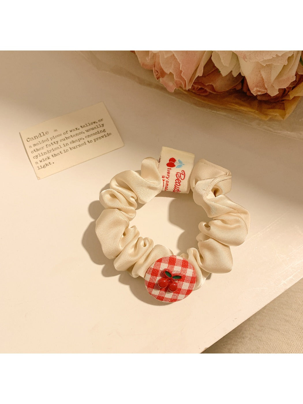 Gifty Sweet Plaid Cherry Hair Tie displayed on a white background highlighting the plaid design