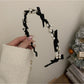 Gifty Sweet Oval Bead Bow Headband laid flat showing full length and bow design