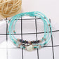 Lovra beaded woven cord bracelet worn with casual outfit on wrist