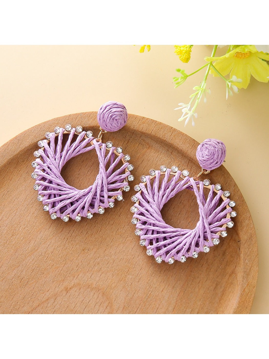 Detailed shot of the clasp mechanism on heart-shaped drop earring