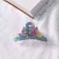 Top view of Beau acetate bow shaped claw clip showing bow shape details