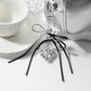 Keypus - Silver Tone Bow and Heart Keychain