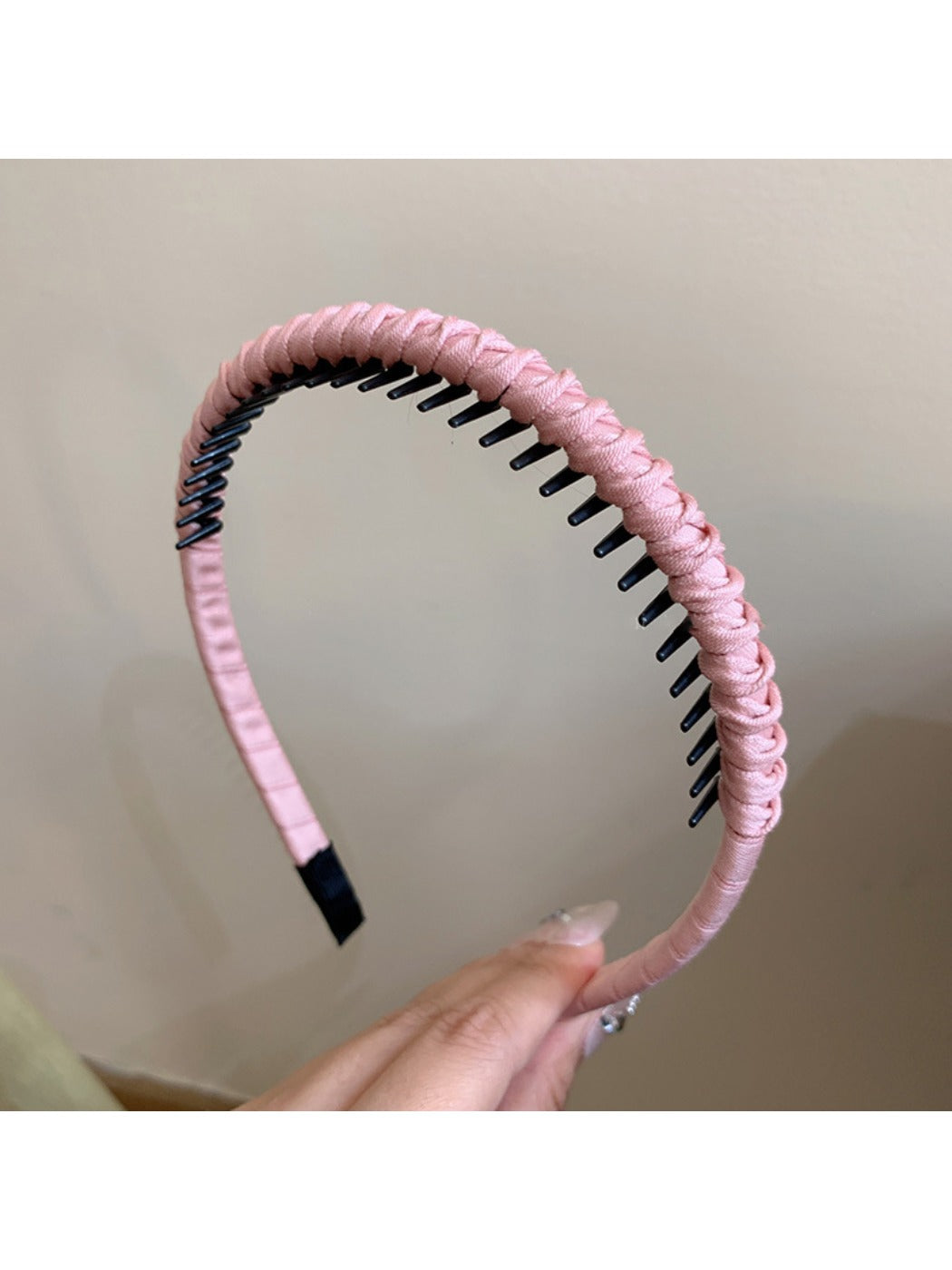 Gifty headband shown in multiple solid color options on display