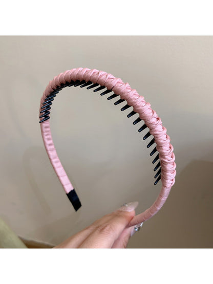 Gifty headband shown in multiple solid color options on display