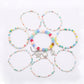 Close-up of Lovra bracelet showing detailed arrangement of small multicolored beads