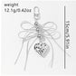 Keypus - Silver Tone Bow and Heart Keychain
