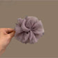 Beau purple mesh hair clip with elegant bow design