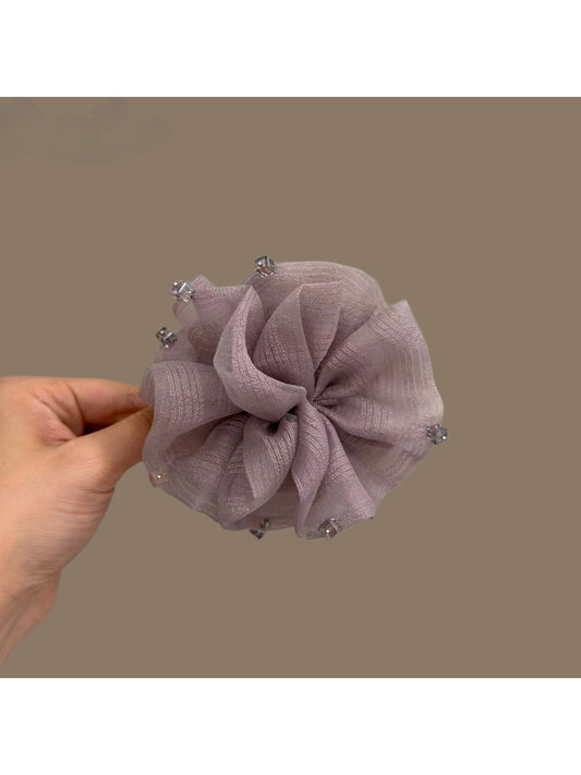Beau purple mesh hair clip with elegant bow design