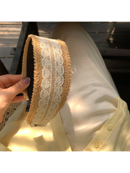 Soft straw woven lace headband styled with loose hair on female model
