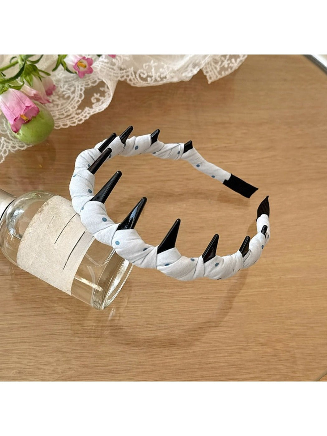 Gifty Sweet Polka Dot Headband displayed flat with bow centered