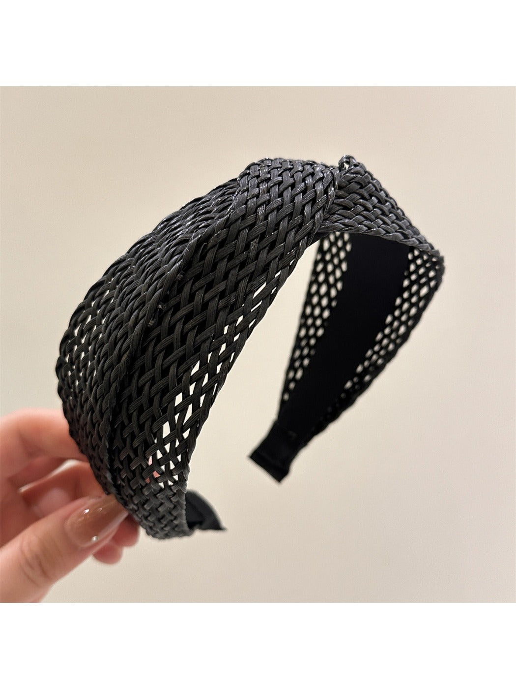 Top view of Gifty woven cross headband highlighting cross design
