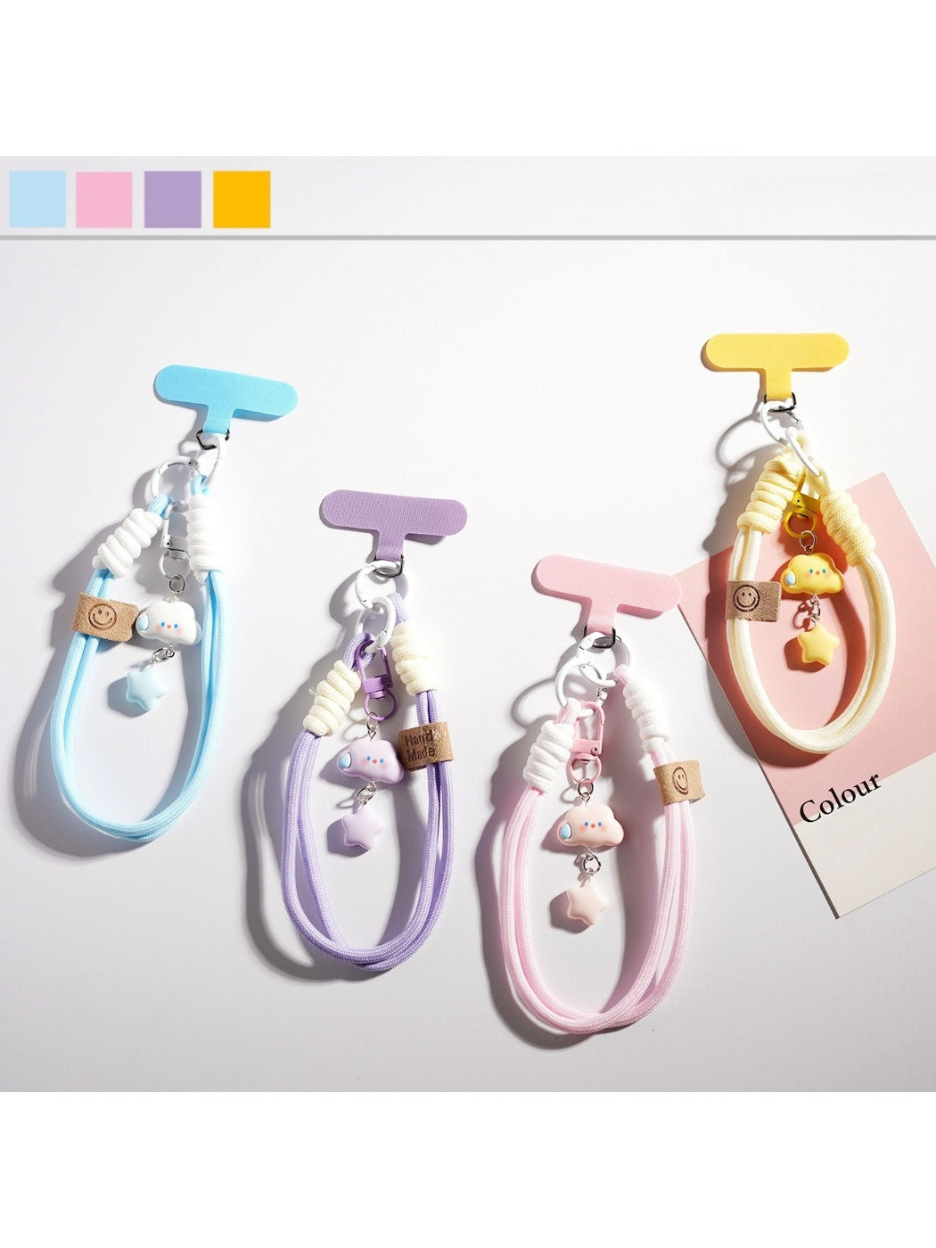 Cute cloud and star shaped keychain with pastel colors on a white background