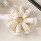 Side view of Gifty elegant scrunchie showing striped pattern and texture
