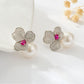 Earedge - Polished Floral Accent Stud Earrings