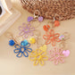 Close-up of raffia hollow flower shaped keychain with natural woven texture