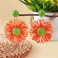 Earedge raffia flower shaped drop earrings styled with casual outfit