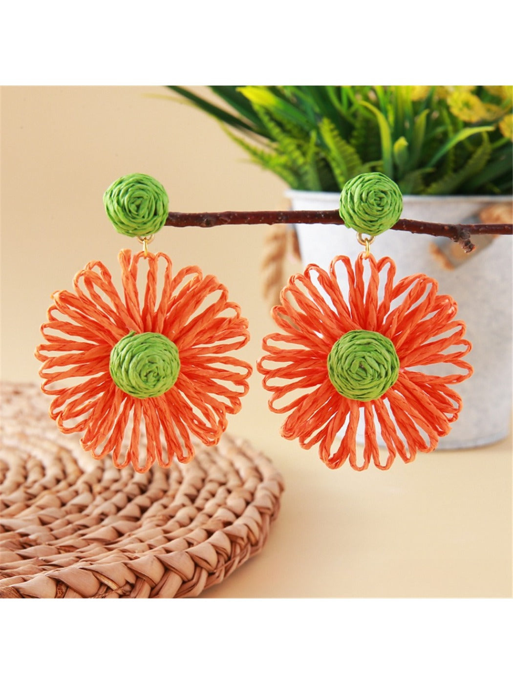 Earedge raffia flower shaped drop earrings styled with casual outfit