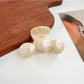 Beau elegant wavy hair claw clip in dark brown tortoiseshell pattern