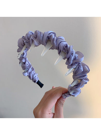 Gifty twist headband worn with ponytail hairstyle