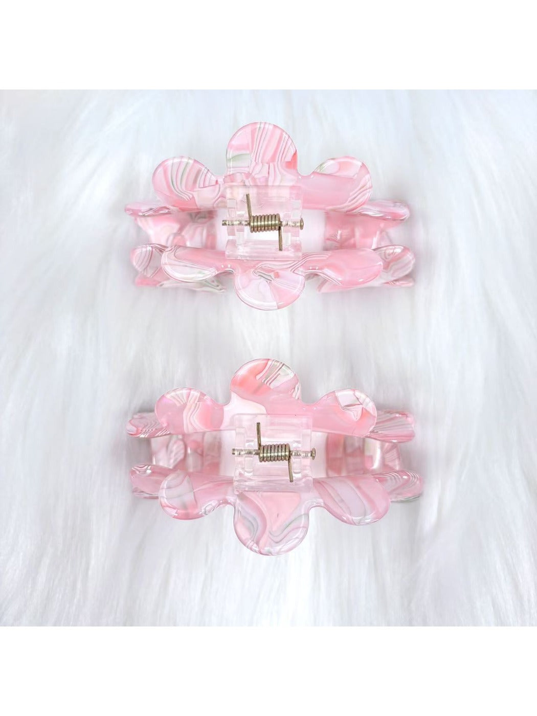 Side view of Beau wavy pink hair clip highlighting wave design