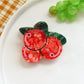 Side view of the fruit shaped hair clip showing the clip mechanism